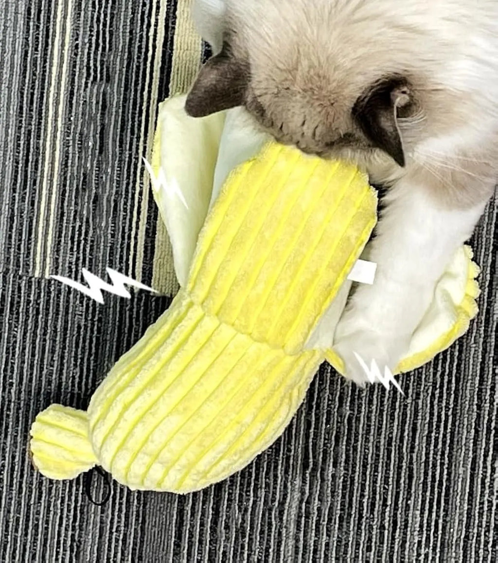 Yellow banana-shaped cat toy with crinkle paper and plush fabric for chewing and kicking