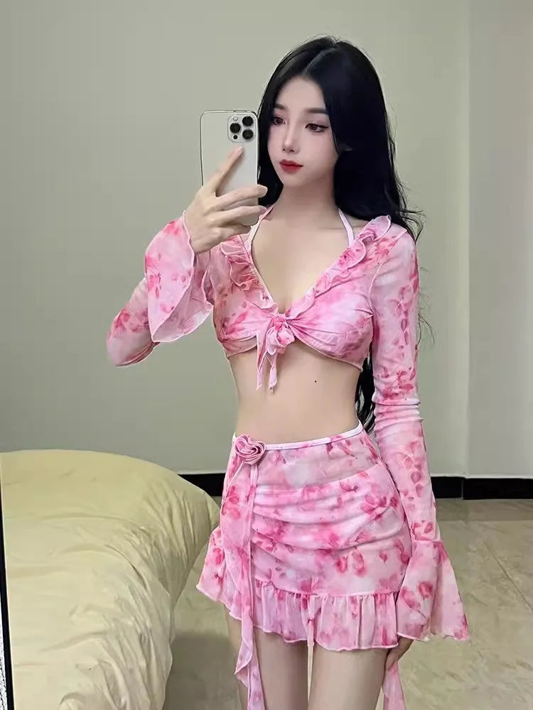 Women's cherry blossom pink floral print bikini set on a mannequin