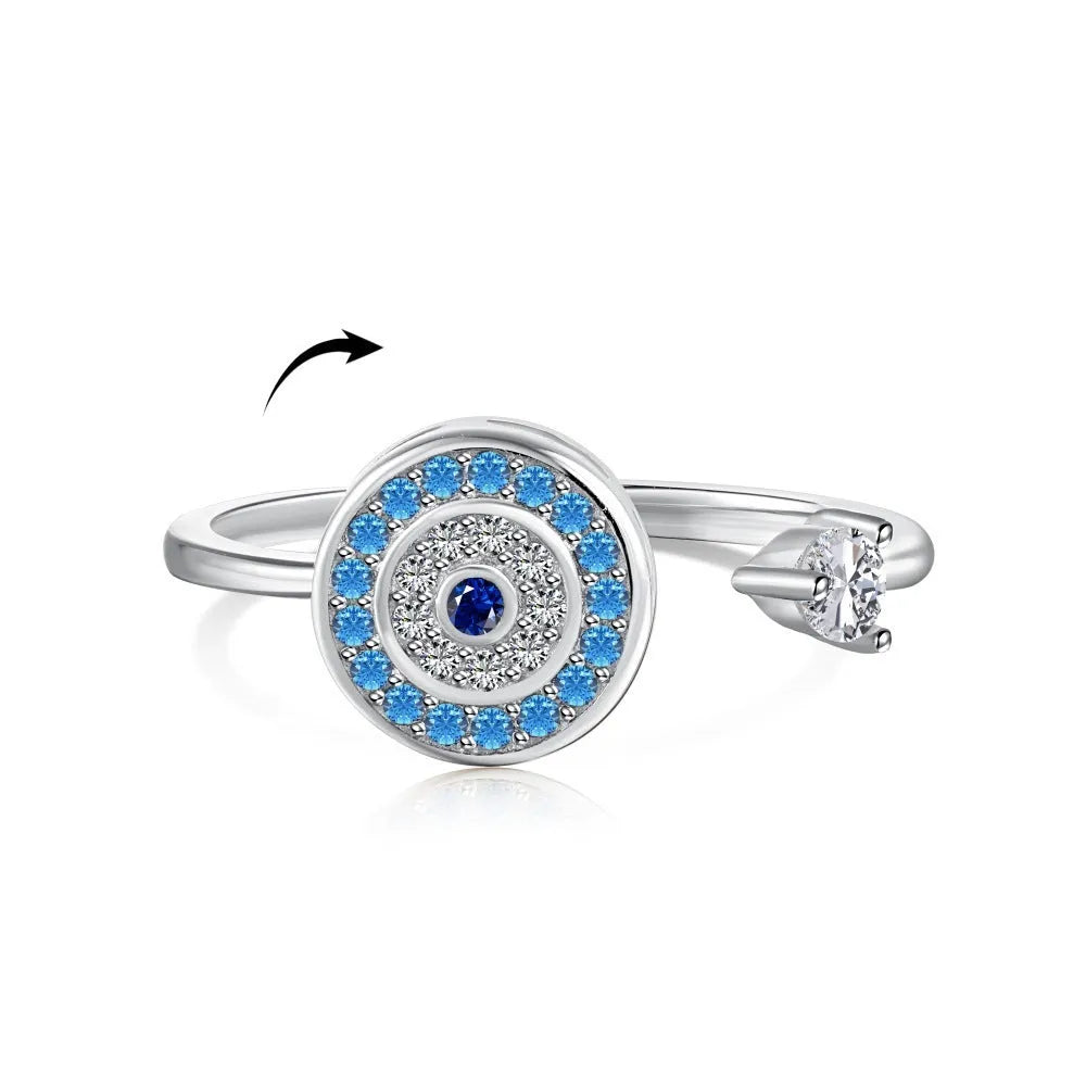 Women's S925 sterling silver ring with sea blue zircon heart or bow shape on plain background