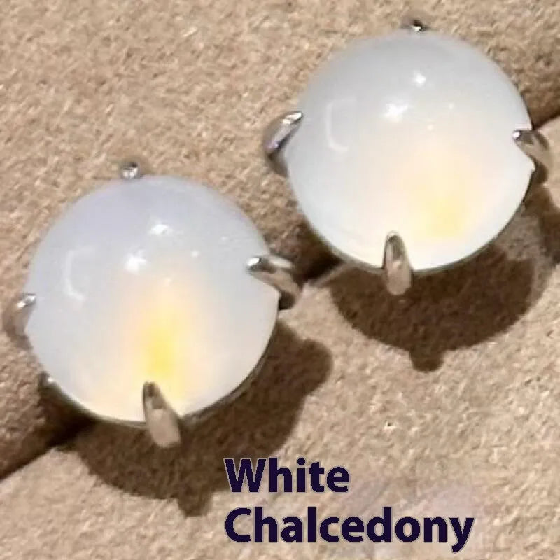 Round egg surface chalcedony stud earrings with four-claw copper setting in retro Chinese style.