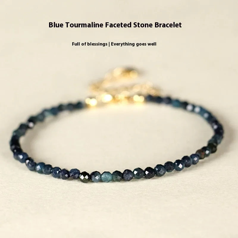 Blue tourmaline bracelet with 3mm cut beads and spacer bead design for women