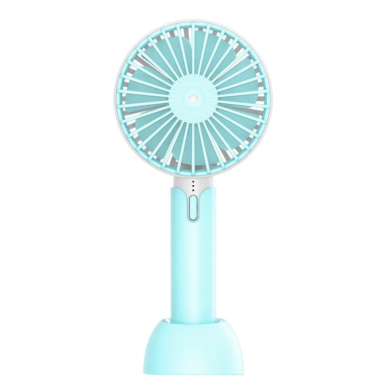 Blue handheld mini electric fan with USB cable and three-speed control on desktop