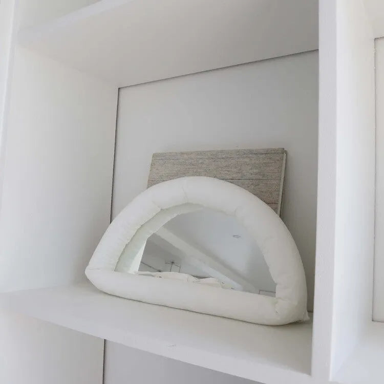 Hanging soft cotton-filled fabric mirror in solid colour for background use