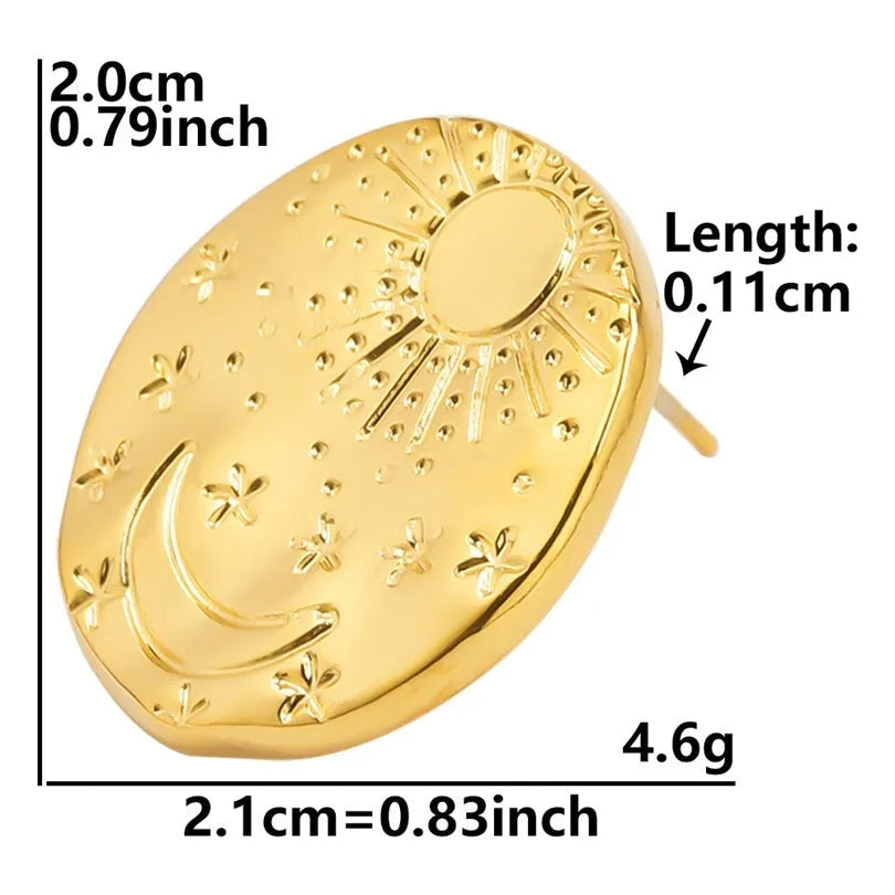 A pair of geometric shell design stud earrings in stainless steel with a gold electroplated finish.