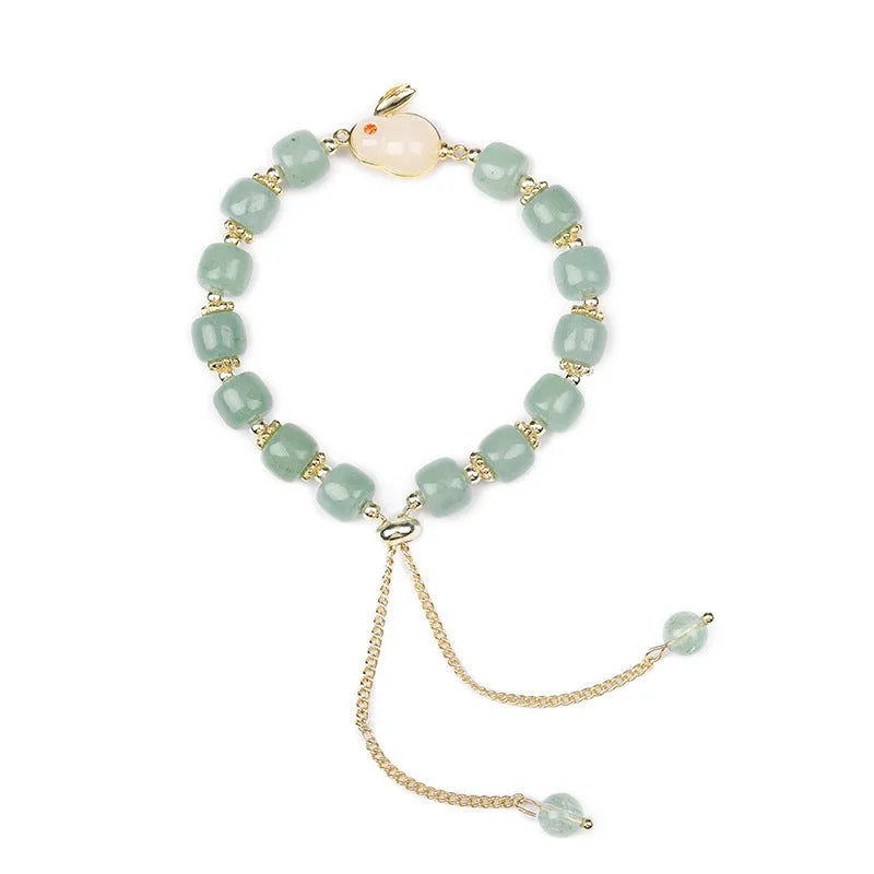 Rabbit bracelet with green aventurine and strawberry quartz beads, copper plating and gold accents