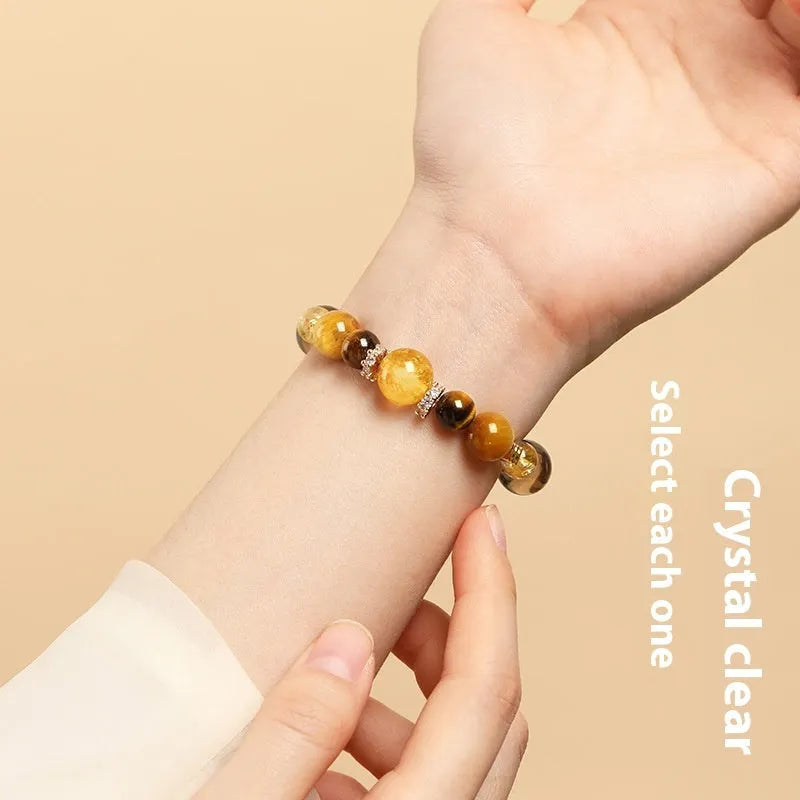 Lucky Jinba natural yellow tiger-eye crystal bracelet with geometric beads, shown in 10MM and 12MM size options.