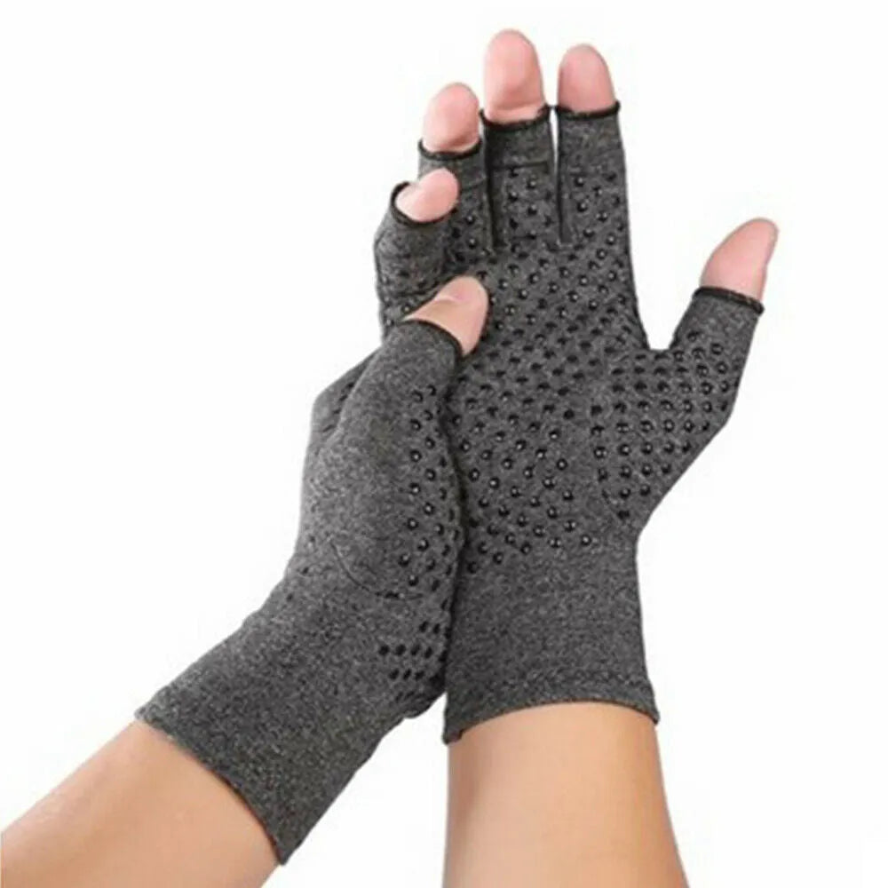 Grey half finger compression gloves with an anti-slip texture, shown laid flat.