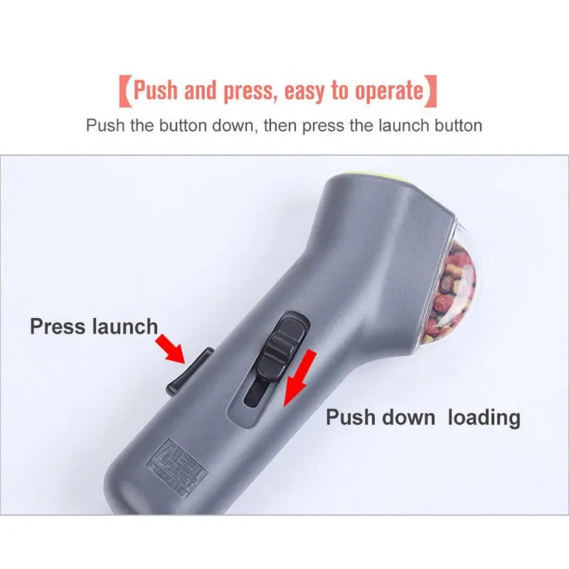 Grey pet snack catapult launcher measuring 18cm with spring trigger for 2-3 metre treat ejection