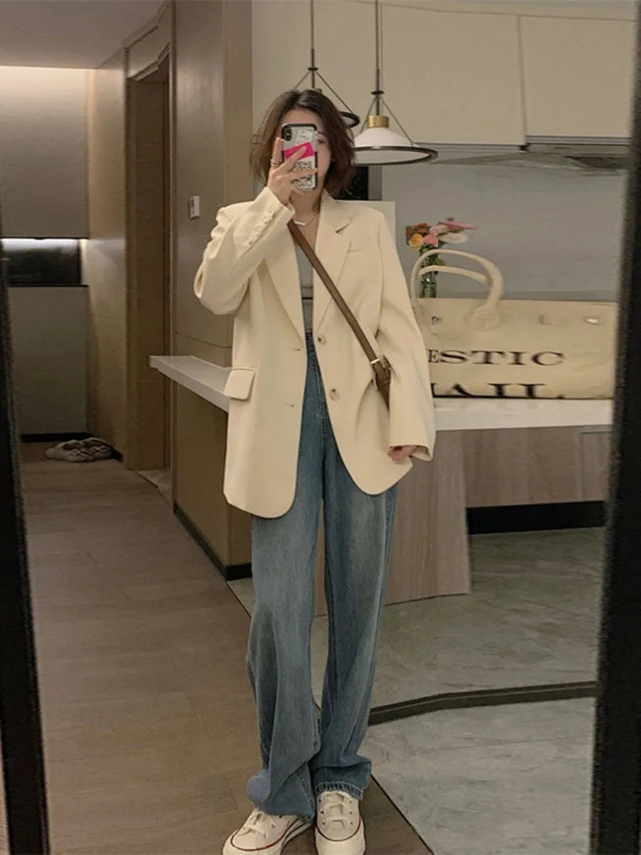 Korean street style polyester suit jacket in milky white colour with pocket detailing and regular sleeves