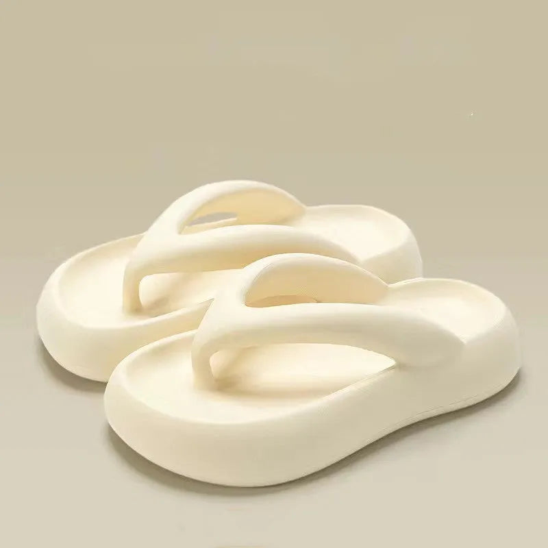 Solid colour EVA flip-flops with a thick sole, bow detail, and thong strap on a plain background.