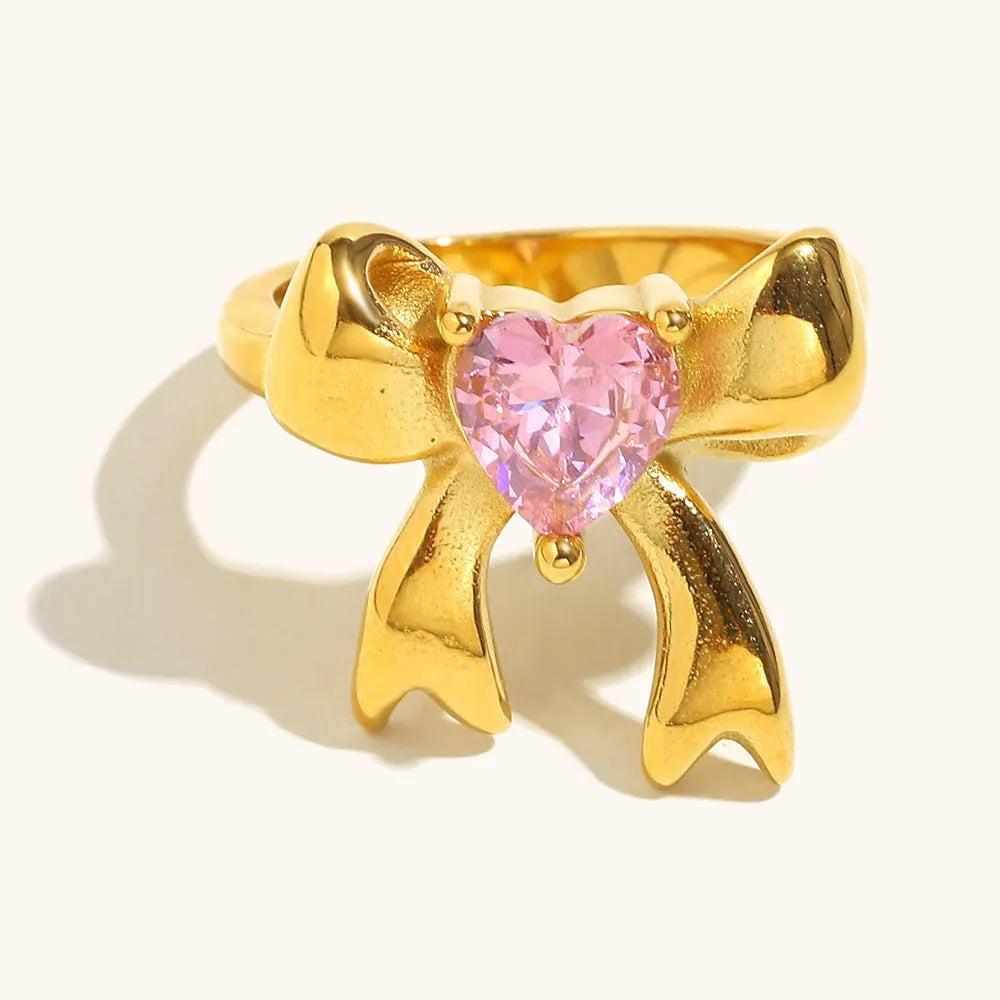 Stainless steel bowknot ring in gold or silver with geometric bow design, sizes No 6 to No 8