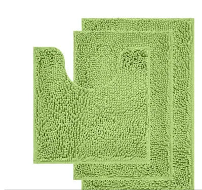 Dark green chenille three-piece U-shaped toilet mat set with non-slip TPR backing on bathroom floor.