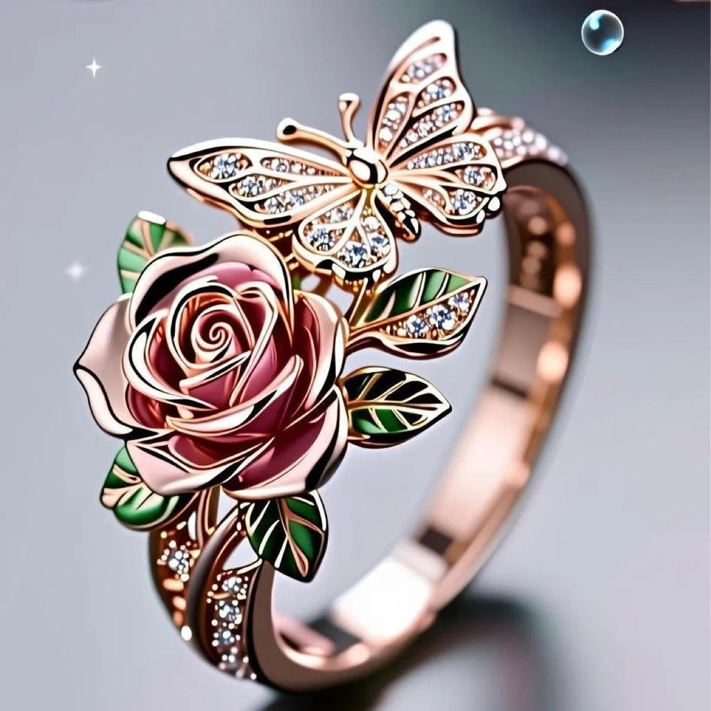 Adjustable fairy style butterfly ring with colourful oil drop centrepiece and leaf design.
