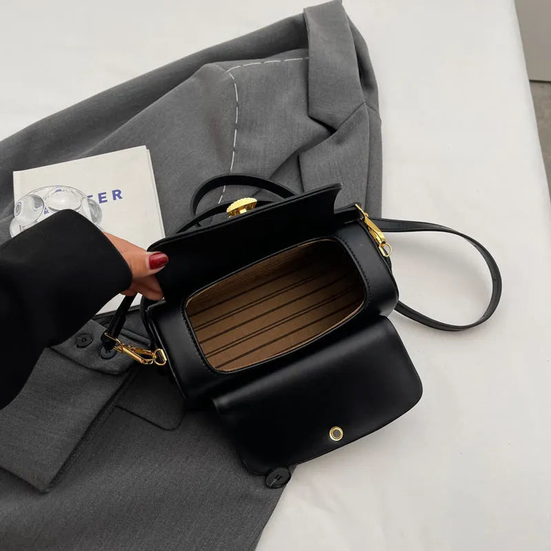 Personalised women's PU leather messenger shoulder bag with letter detailing, shown in beige.