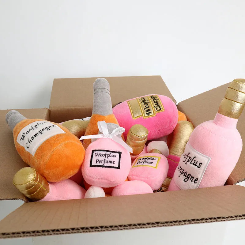 Soft plush dog toy shaped like a colourful wine bottle for gentle chew play.