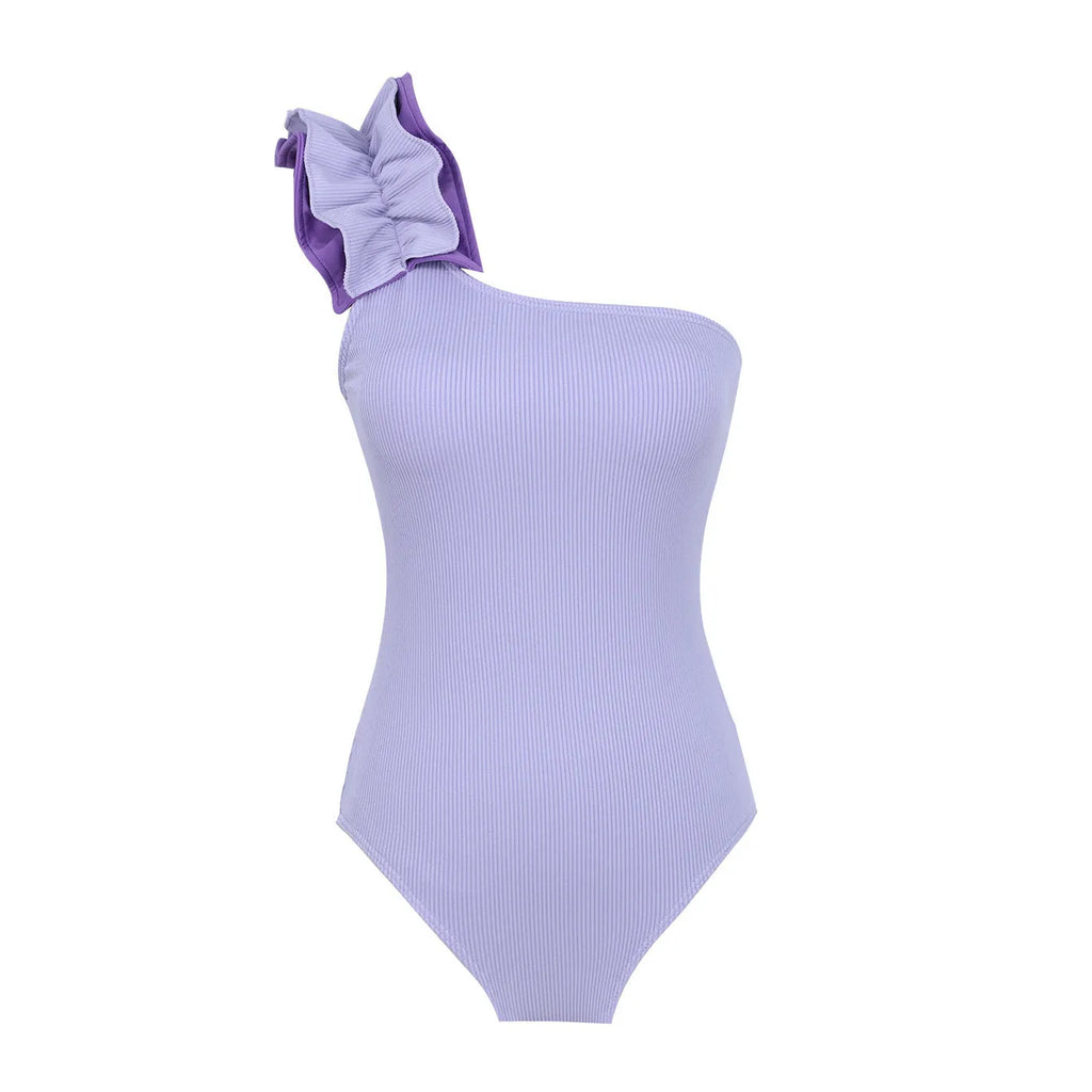 A blue women's one-piece swimsuit with a single suspender strap and a high-waist cut on a mannequin.