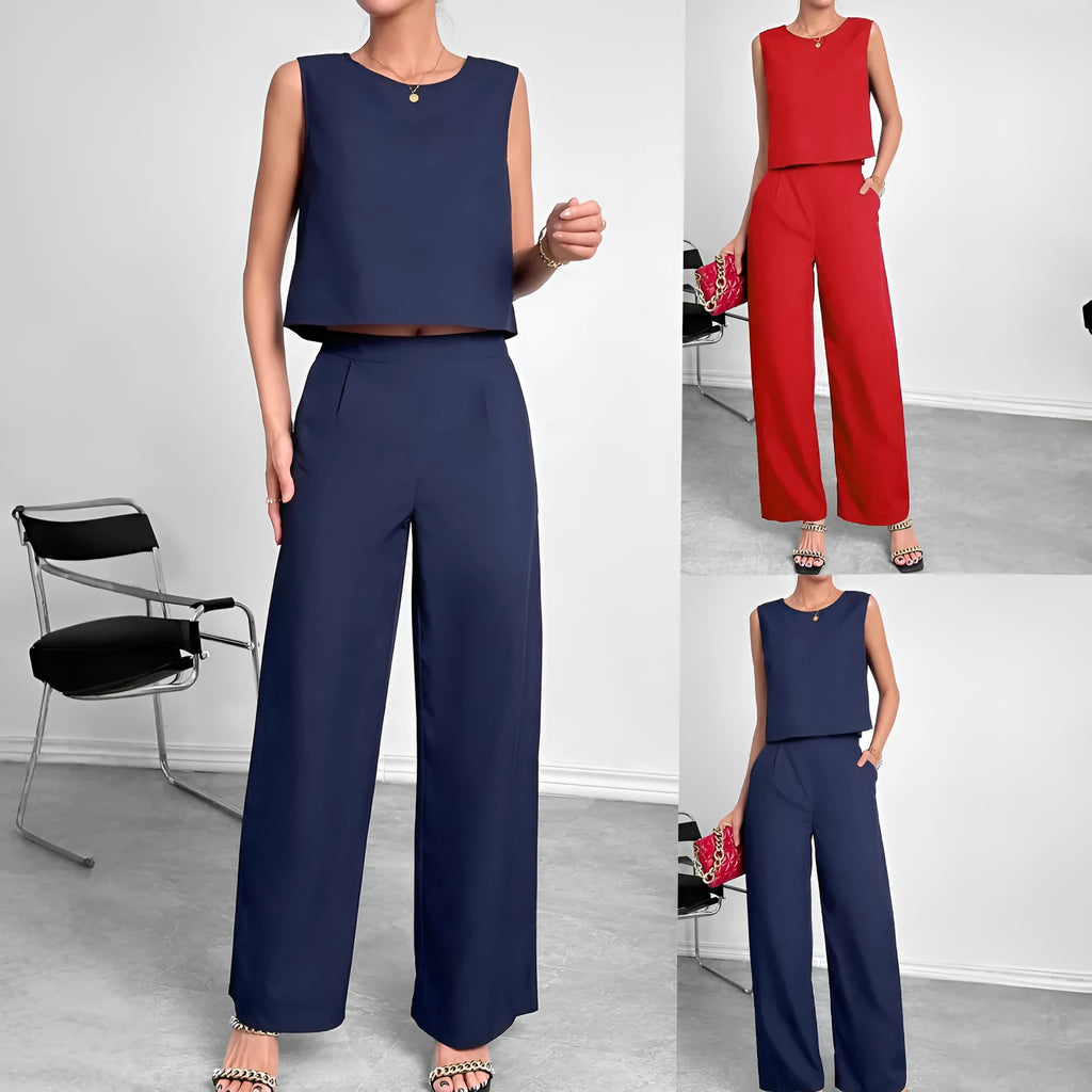 Red women's two-piece set featuring a sleeveless round-neck top and matching wide-leg trousers on a hanger.