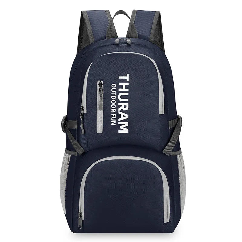 Portable folding shoulder bag 20-35L in dark blue for outdoor hiking