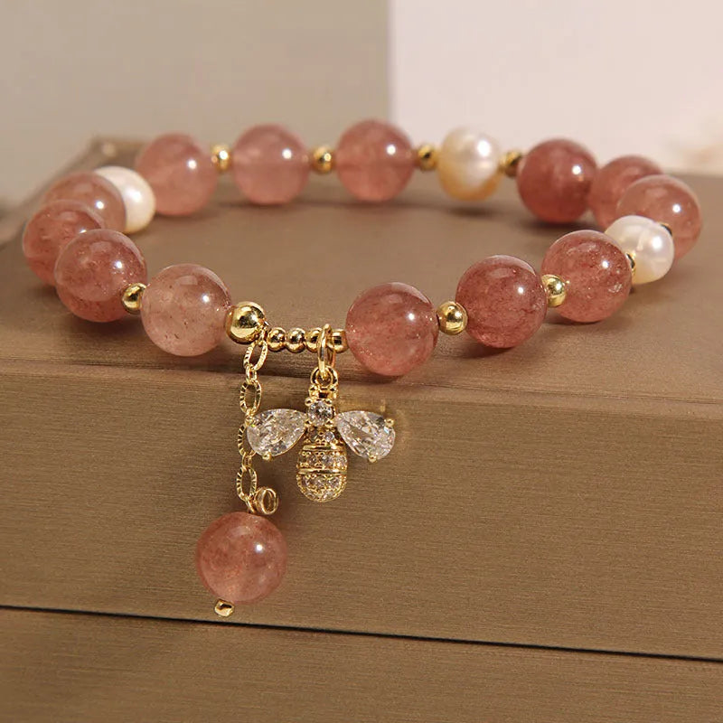 Freshwater pearl and strawberry quartz bracelet with zircon accents and bee charm