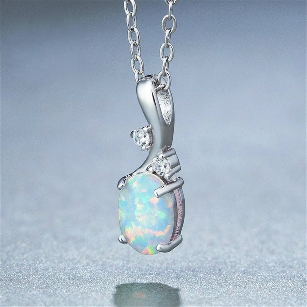 Water drop shaped opal pendant necklace on adjustable O-chain in rose gold or white finish