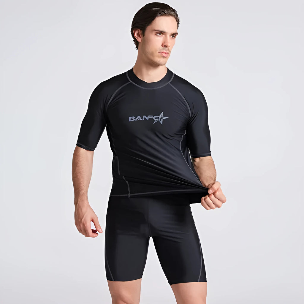 Men's blue quick-dry half sleeve swimsuit for surfing and snorkelling with nylon fabric