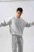 Men's polar fleece suit set showing crew neck jacket and padded trousers in five winter colour options