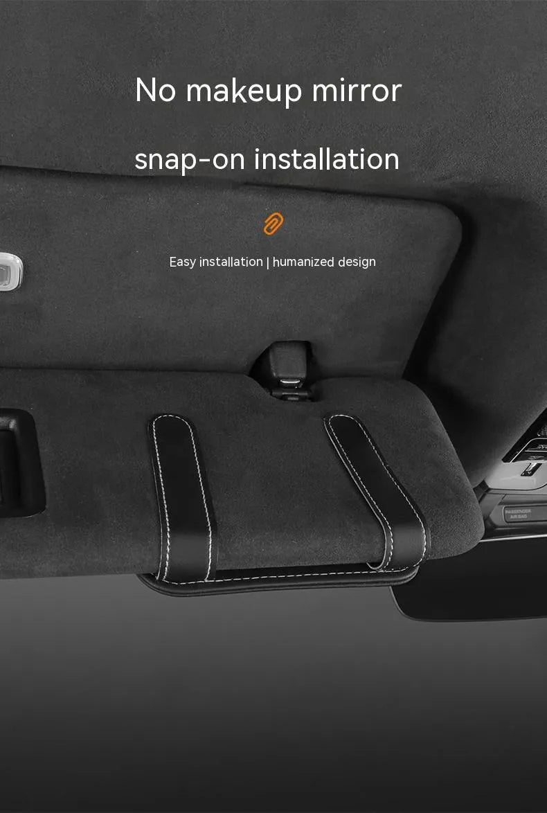 Cowhide car sun visor holder with card slots and a sunglasses clip attached to a grey visor.