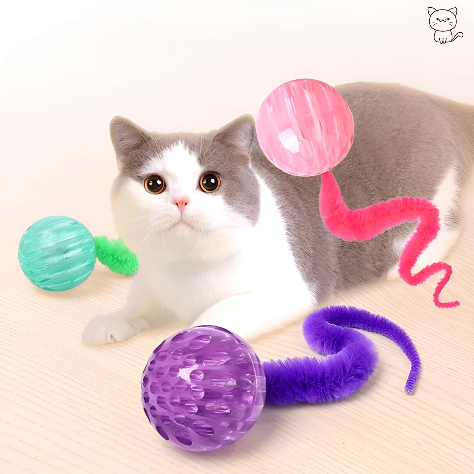 Interactive bouncy ball cat toy with plush tail in green, pink and purple colour options