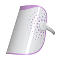 White and purple photon IPL beauty mask facial device on a flat surface