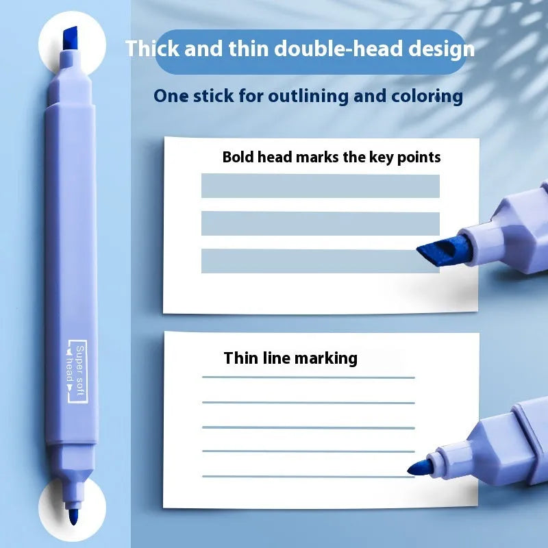 Set of double-tipped fluorescent marking pens in mixed colours on a white background.