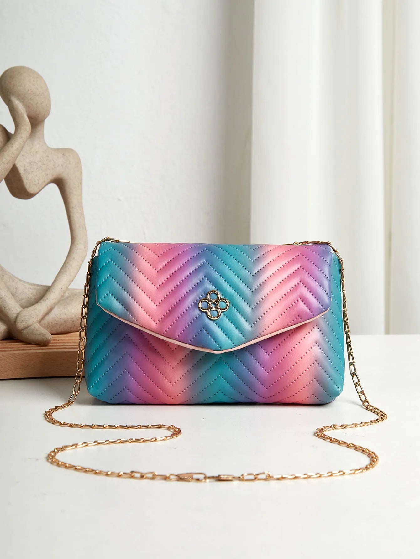 Soft PU clamshell bag with contrast colour pattern and single shoulder strap