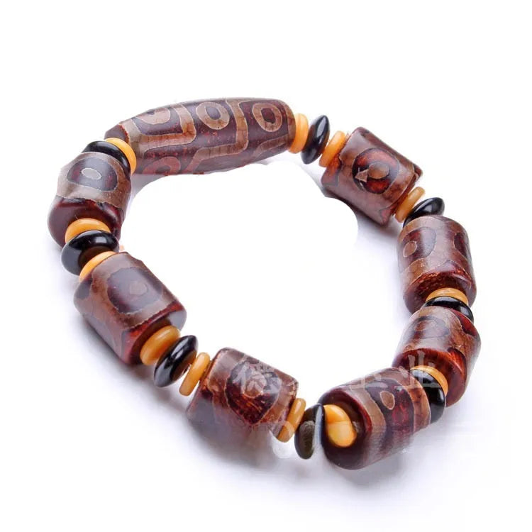 Distressed agate Tibet beads bracelet with three eye dzi design and polished stone beads