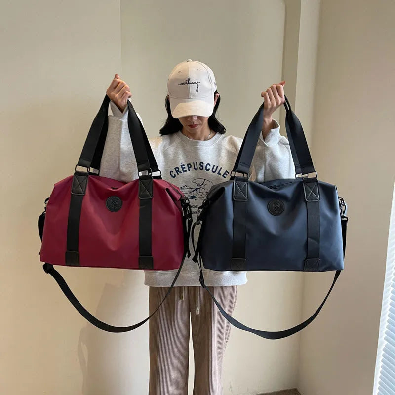 Waterproof Oxford cloth travel luggage bag in solid colour with 36-55 litre capacity