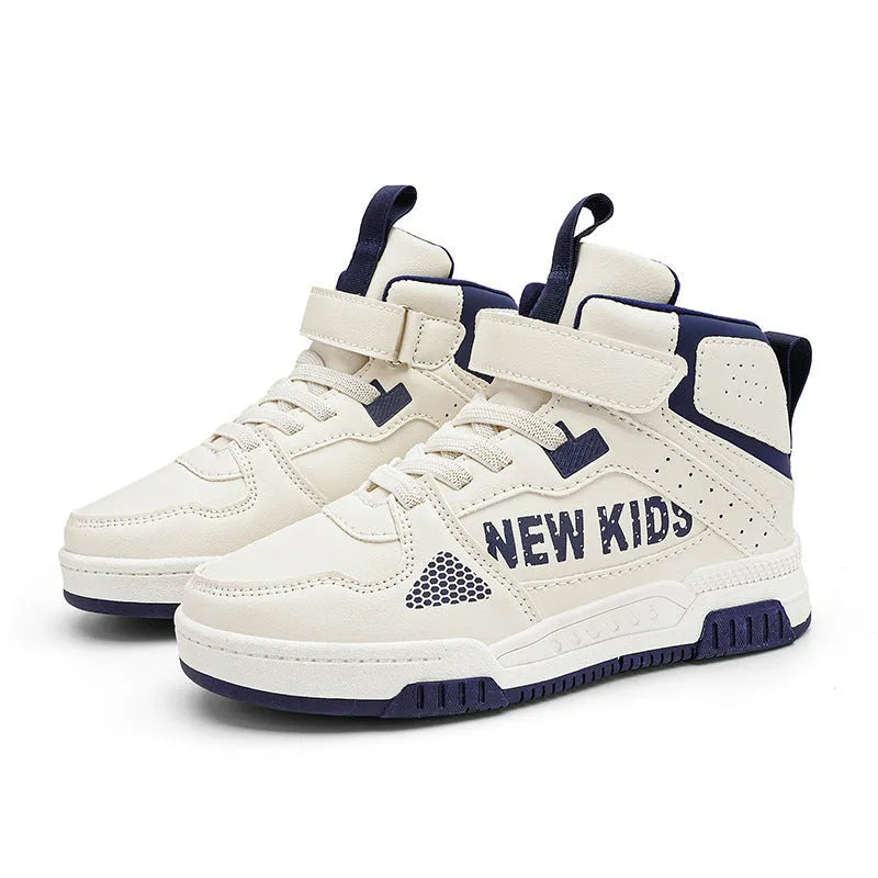 Children's buckle-fastened street sneakers in neutral colours with PU upper and rubber sole.