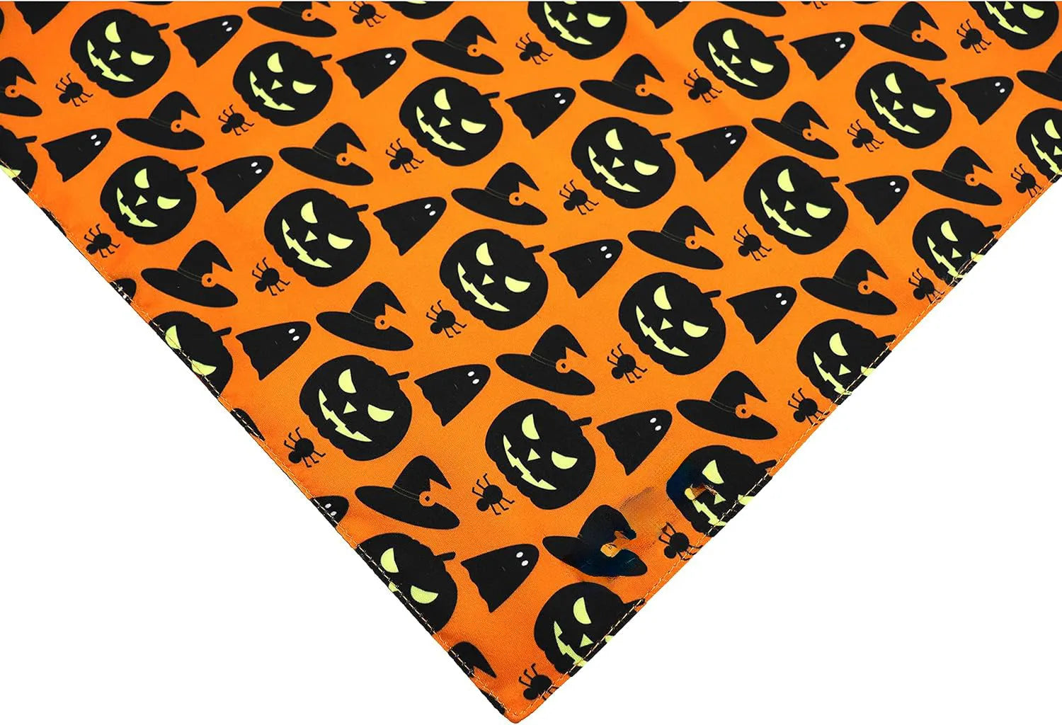 Reversible Halloween dog bandana with pumpkin and spider web patterns in black and orange