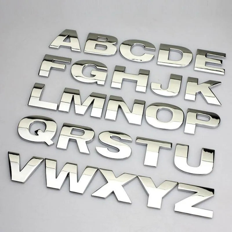 Zinc alloy metal car letter sticker in black or silver, 2.5cm size, for vehicle personalisation.