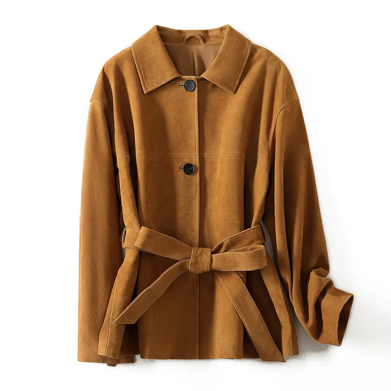 Yellow brown retro cashmere coat with Peter Pan collar, leather stitching, and a belt on a hanger.