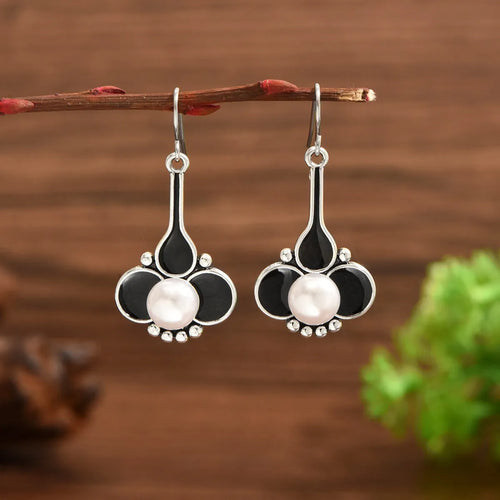 Pair of silver retro-style fashion earrings for women with alloy electroplated construction