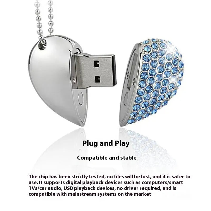 Brick-inlaid heart-shaped metal USB flash drive in multiple colours on a white background.
