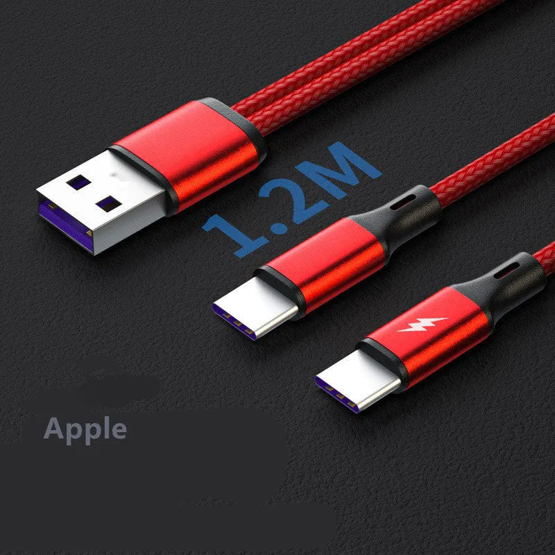 Black braided two-in-one USB charging cable with two Android connectors on a table.