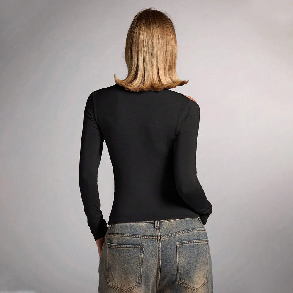 Black women's halter top with slim fit and long sleeves on a model.