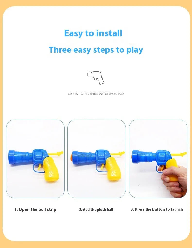 Pet toy launcher gun with soft plush balls for fetch games.