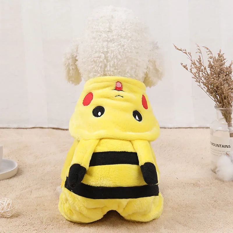 Small dog wearing a red fleece winter coat with cartoon ears, showcasing the costume design.