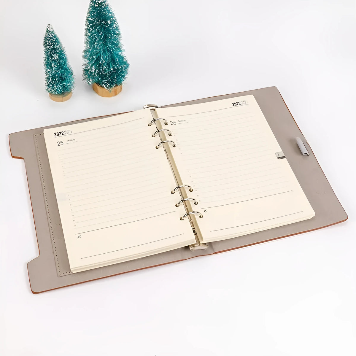 A5 loose-leaf notebook inner pages with monthly plan layout on white paper