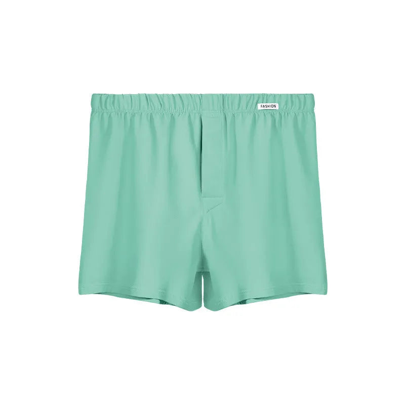 Men's loose-fitting cotton boxer shorts in solid colours with mid-waist design