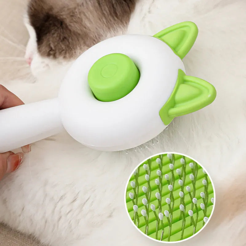 Greenish white and orange white self-cleaning cat comb with stainless steel bristles for pet hair removal.