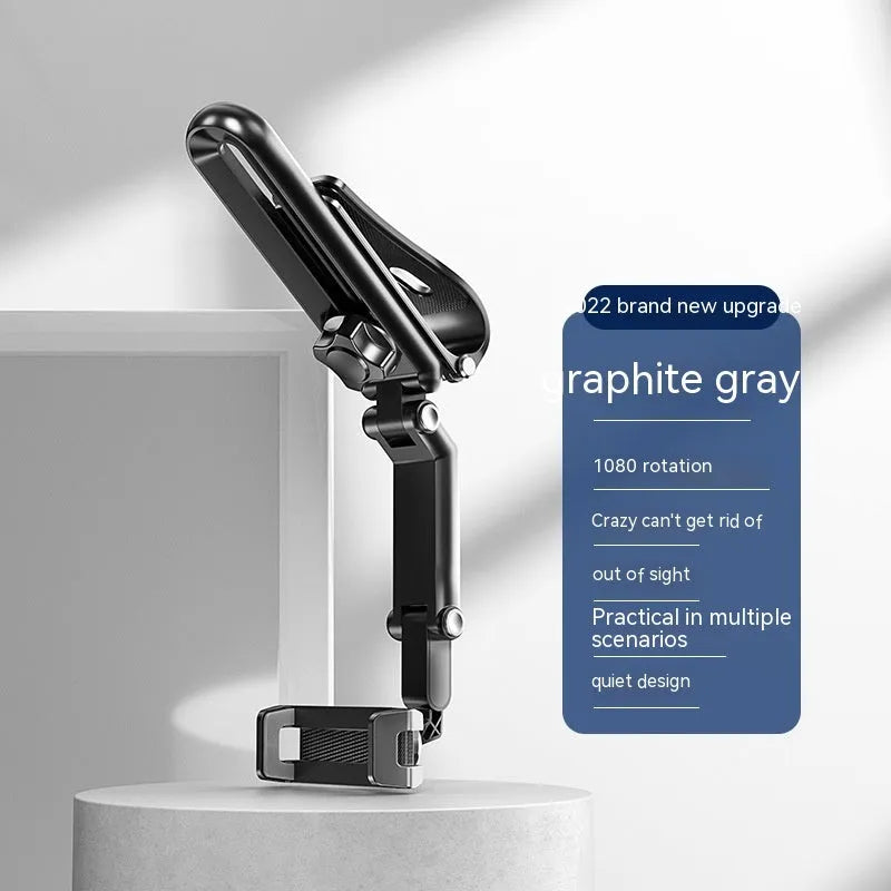 A black and grey car phone holder bracket clipped onto a vehicle air vent.