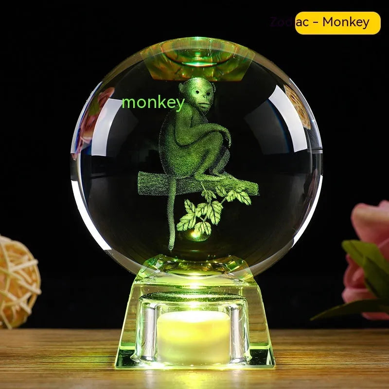 White crystal ball lamp with Chinese zodiac animal figurine on LED electronic base