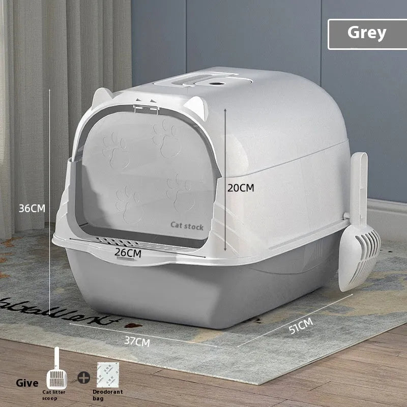 Oversized enclosed PP cat litter box with lid in grey colour, placed on floor