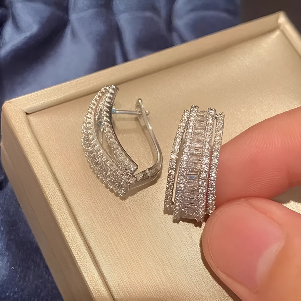 Geometric stud earrings with white gold colour finish and inlaid zircon stones